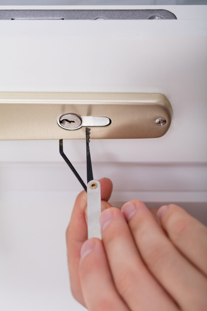 Lockpicker Hand Fixing Door Handle At Home